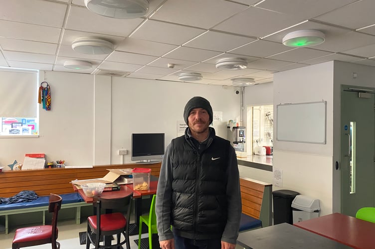 Michael Dixon in the day room at Julian House's Manvers Street Hostel.
