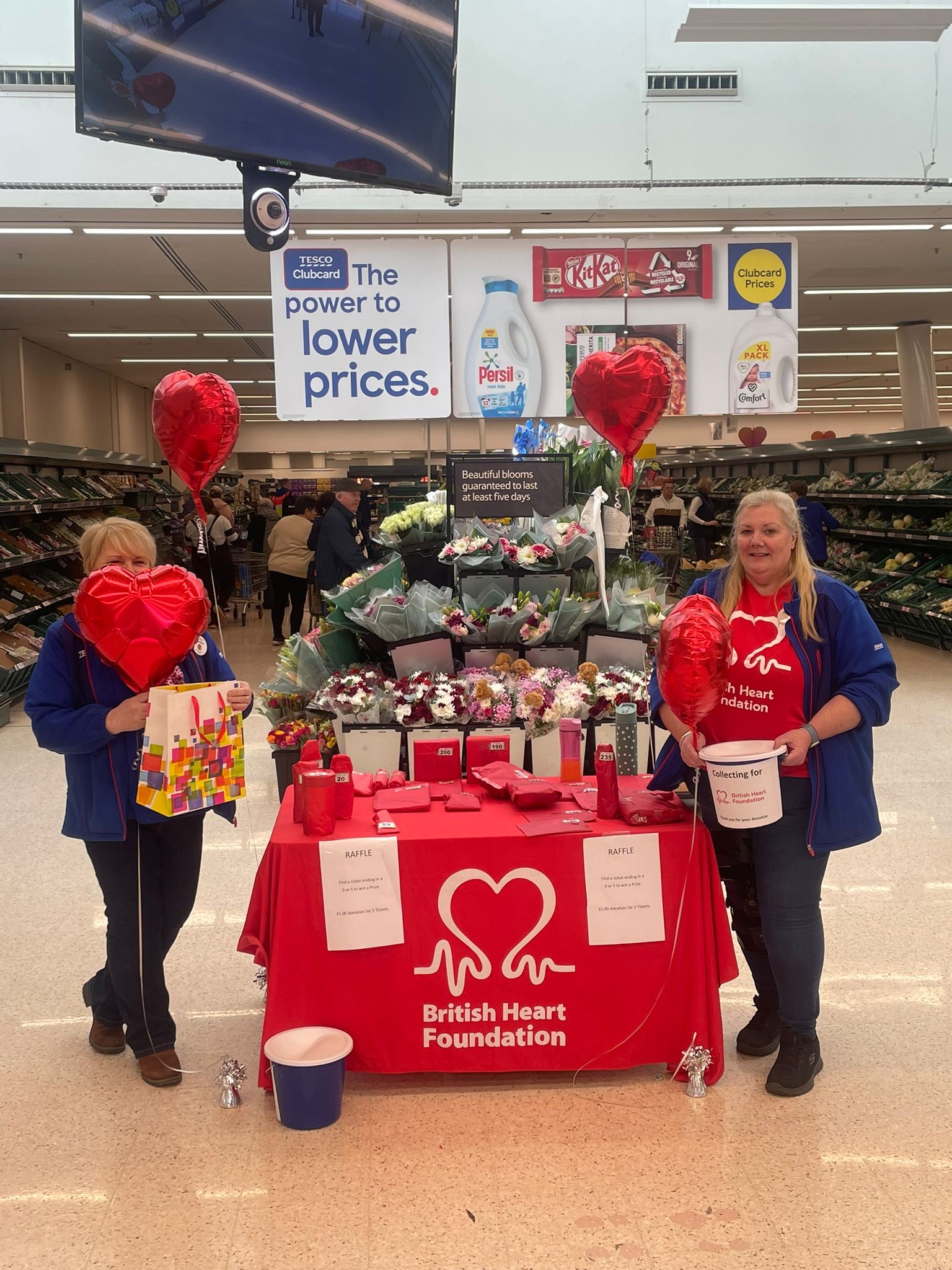 Tesco turns red to raise funds