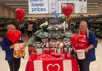 Tesco turns red to raise funds