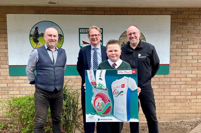 Leo, who is pictured alongside the main race sponsors, Mark Houlford of Brock & Houlford, Justin Taylor, of Winford Ford Car Sales and Service Department, and Gareth Beynon, headteacher at Chew Valley School. 