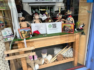 Group forced to cover dolls' private parts after display complaints