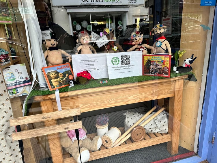 The now covered naked knitted dolls at The Hive café and haberdashery in Shepton Mallet, Somerset (Mike Alford/SWNS)