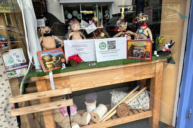 The now covered naked knitted dolls at The Hive café and haberdashery in Shepton Mallet, Somerset (Mike Alford/SWNS)
