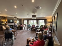 Local author discusses fond memories with care home residents