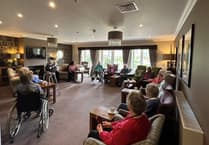 Local author discusses memories of bygone days with care home residents
