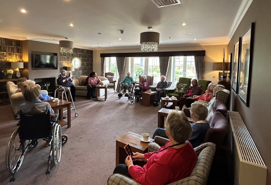 Local author discusses fond memories with care home residents