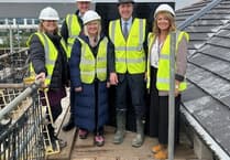Oyster Care Homes hold special ceremony as roof gets added to Somer Valley House