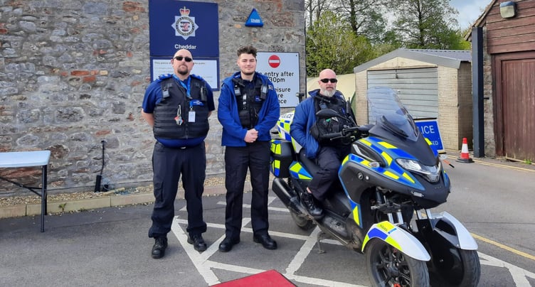 The Cheddar policing team with a hybrid motorbike