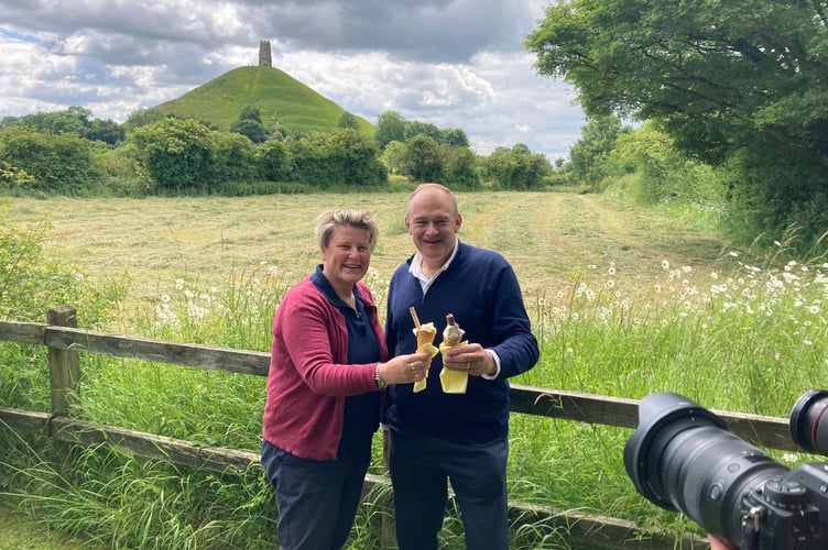 Glastonbury and Somerton candidate Sarah Dyke with Lib Dem leader Sir Ed Davey in the shadow of Glastonbury Tor (Daniel Mumby)