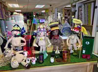Knitting group returns with 'naked' Glastonbury Festival dolls