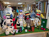 Knitting group returns with 'naked' Glastonbury Festival dolls