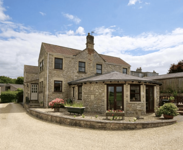 Period cottage with 'cider press' living room on the market for £800K