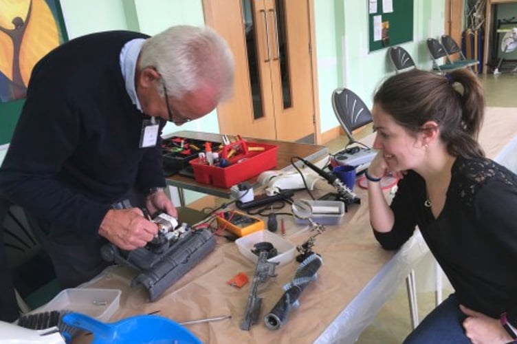A volunteer in action at Peasedown Repair Cafe