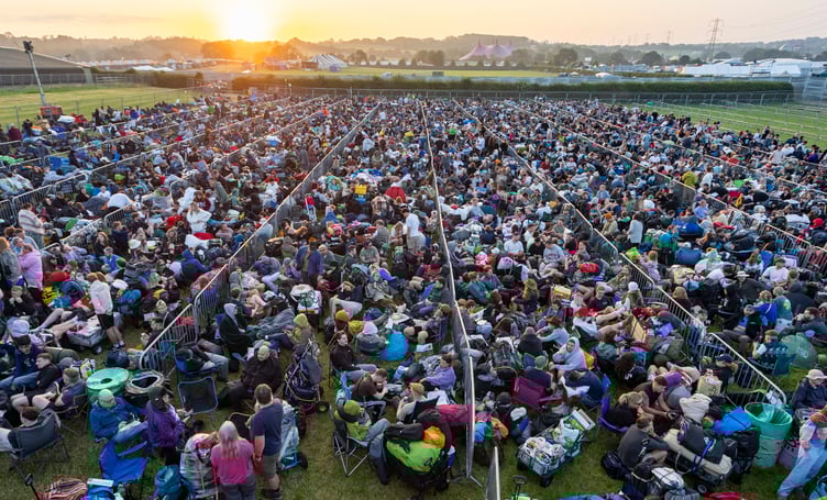 Large queues ahead of the opening of Glastonbury Festival. Glastonbury, Somerset. June 26 2024.  For the next five days the festival will become the most densely populated place on earth.