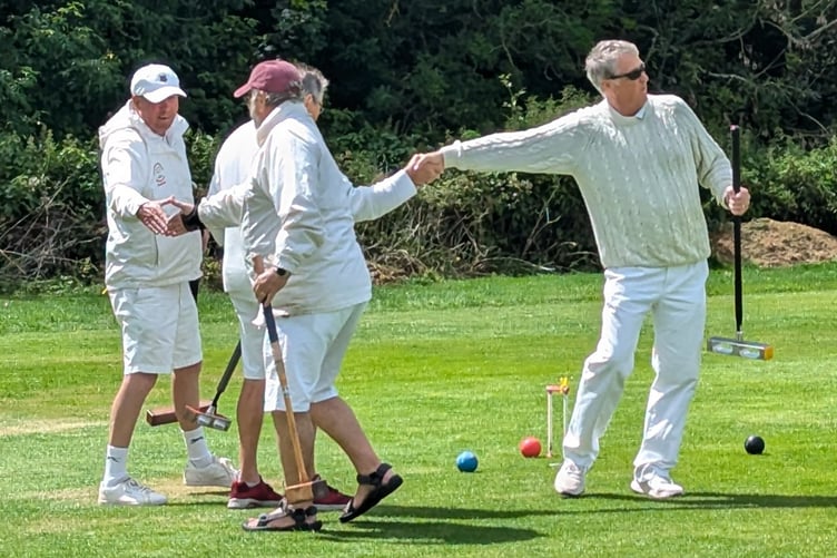 Budleigh Salterton players have an ‘unconventional‘ way of shaking hands!