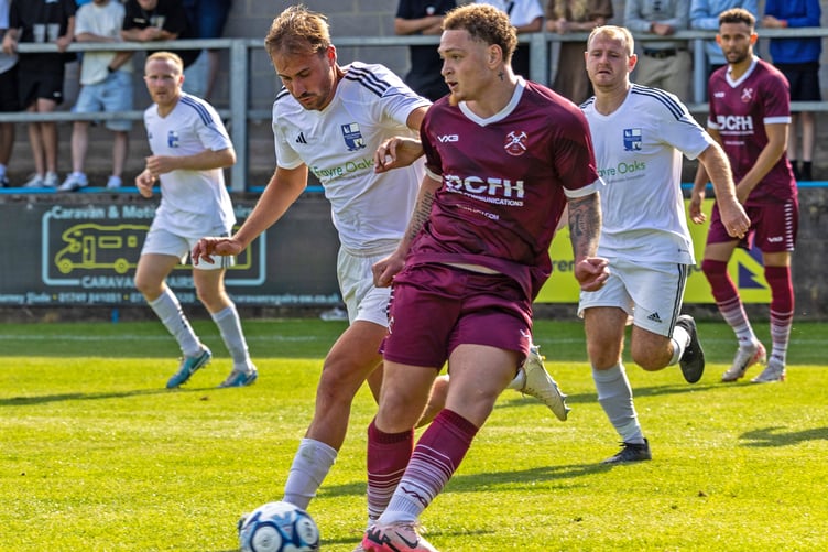 Action at Paulton Rovers' game against Nailsea & Tickenham