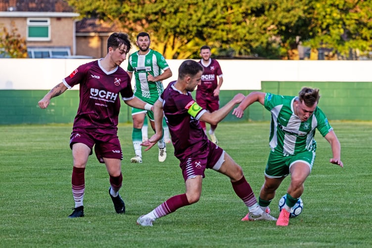 Action at Paulton Rovers' match against Street