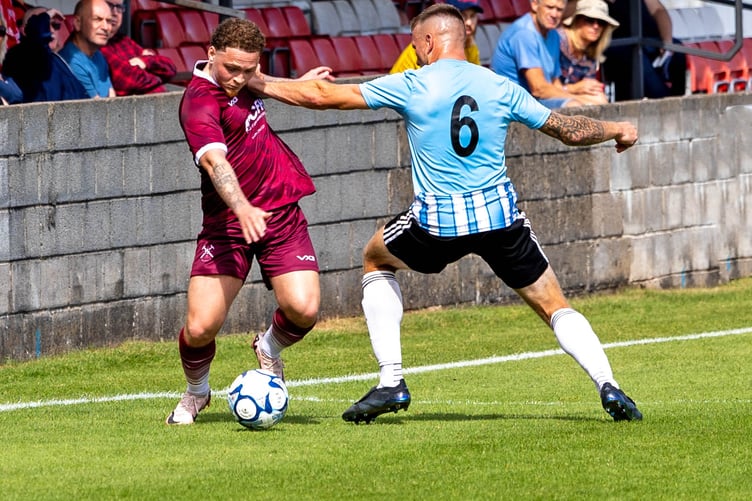 Action from Paulton's home game against Barnstaple Town