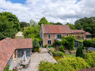 Paradise in Penford: Two stone homes and pool house comes to market