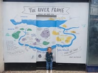 Mural showing water cycle and River Frome links brightens vacant shop