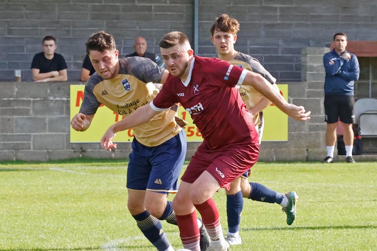 Action from Paulton Rovers' 3-0 home win over Torridge in the FA Vase on Saturday