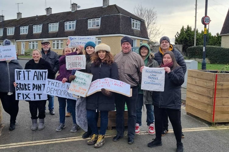 Locals protest, calling for the planters on Southlands to be removed