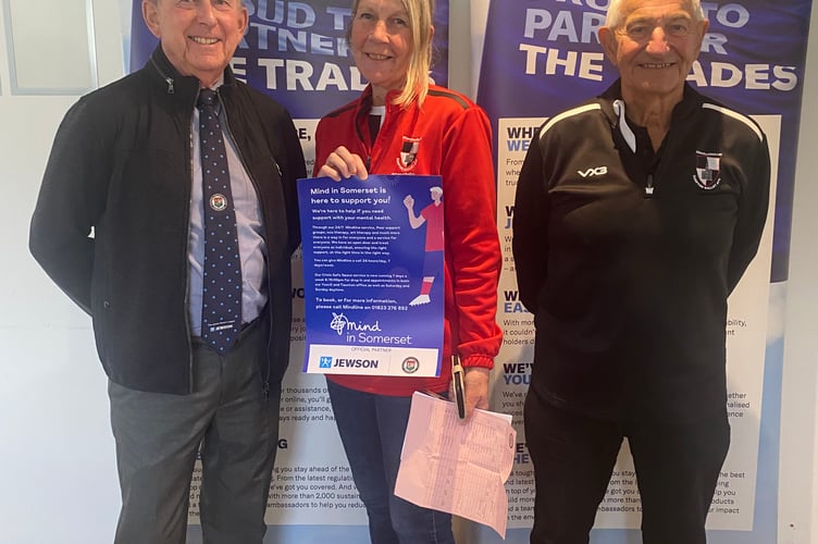 Left to right, John Pool, chairman of the Jewson Western League, Sally Robertson, secretary at Shepton Mallet Football Club, and Rodney Neale, club secretary.