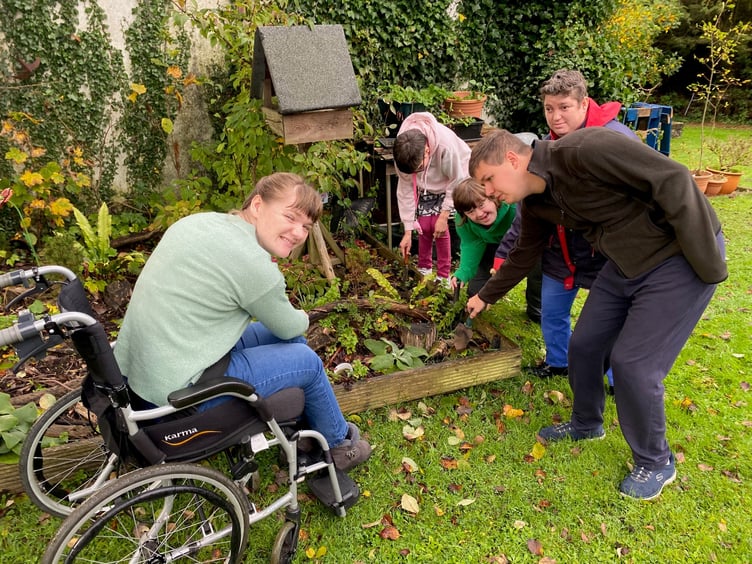SWALLOW members planting the crocus bulbs