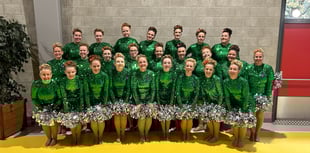 Fundraising event sees man swim 25 kilometres for baton twirling team