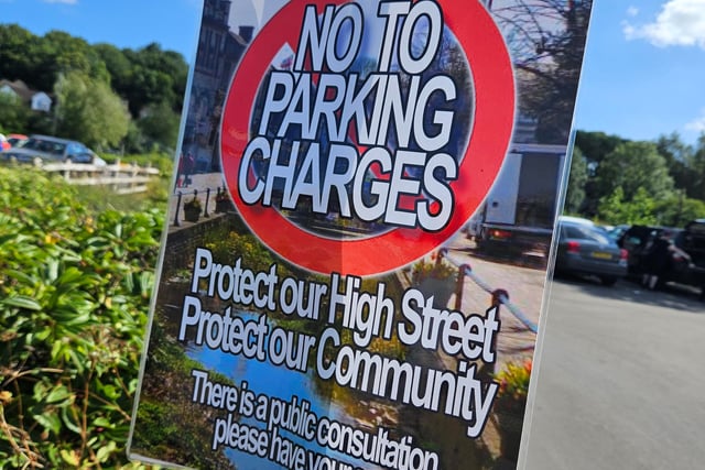 Calls to suspend town parking charges until evidence 'justifies it'