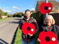 Poppy display removed from village amid claims of 'hate campaign'