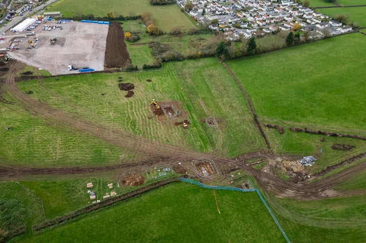 Aerial images show work being commenced to build a bypass near Banwell, Somerset. November 12 2024. Drone pictures show work is finally underway on building a bypass to save a village from gridlock - after a 100 year wait. Locals are celebrating in Banwell after areas were cleared to build the road and ease the severe congestion that has made the centre of the village a 'no go' zone for decades. The once-thriving Somerset community of 3,200 people has lost dozens of shops with health studies also showing higher rates of breathing-related health issues among its school pupils. But planning permission and funding was secured a year ago for the long-awaited bypass - with hopes it will be fully open to traffic by March 2026.