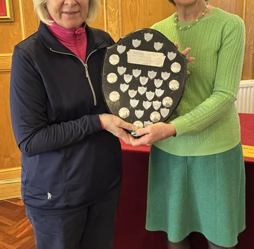 The Ladies Alliance A team captain Marion Speed, on the left, being presented with the trophy for Mendip winning Div 3 of the Bristol & District Alliance League. 