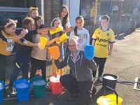 Pupils wash cars to raise money for Children in Need