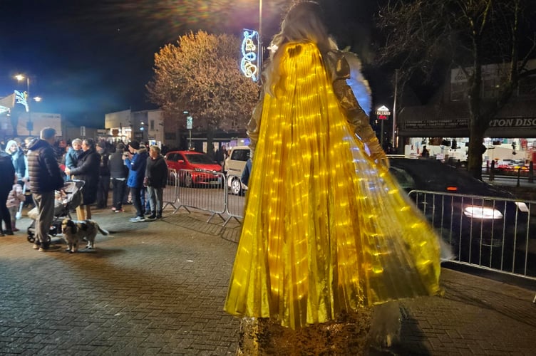 People dressed in elaborate carnival attire and towering stilts added a vibrant and festive touch.