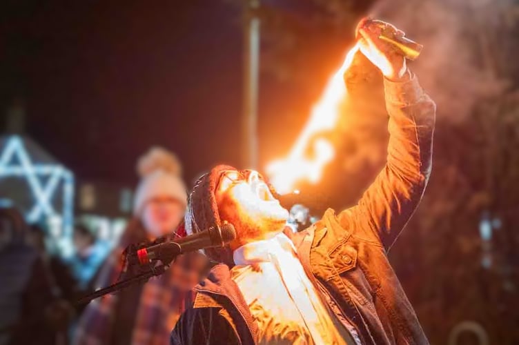  Nathael Worsley captivates the crowd with an impressive fire performance during the Christmas tree light switch-on event in Westfield.