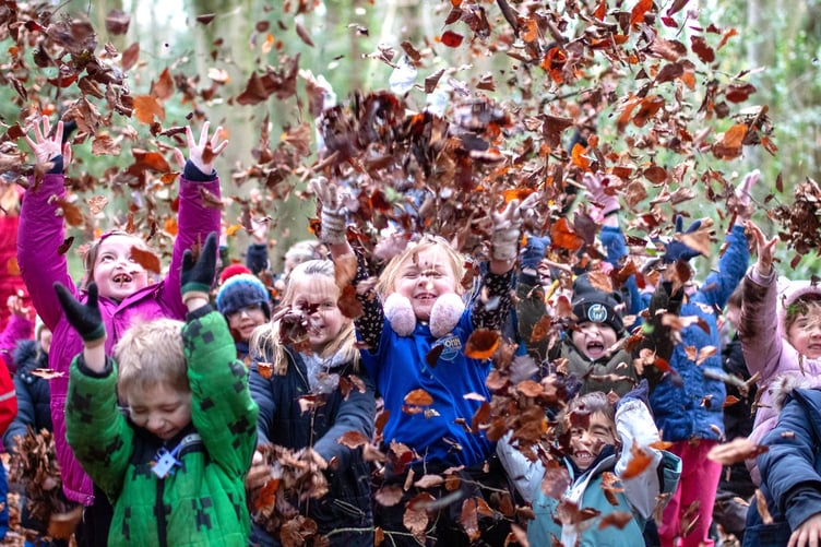 Children from Peasedown St John Primary School enjoying hands-on outdoor learning during their Forest School initiative at Camerton Wood.