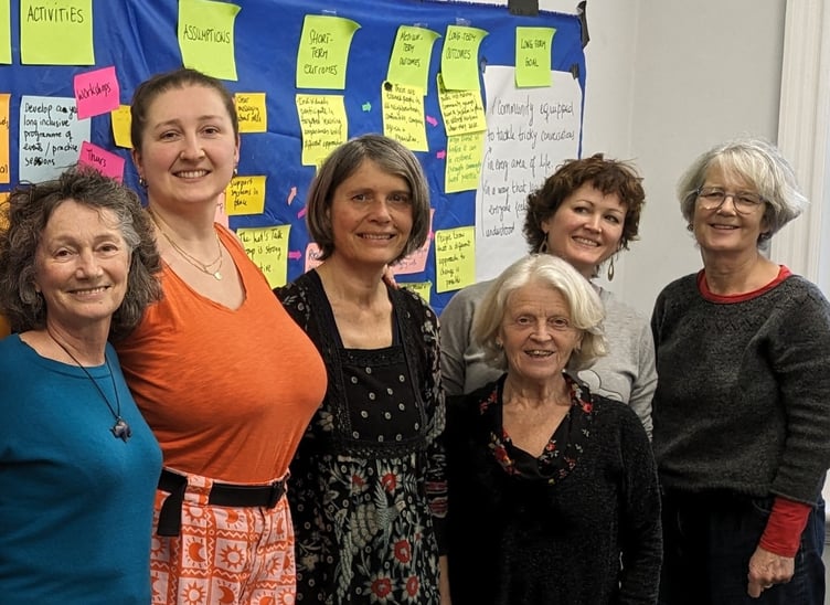 Members of the Let’s Talk community group participating in a session to improve communication skills and resolve conflicts.