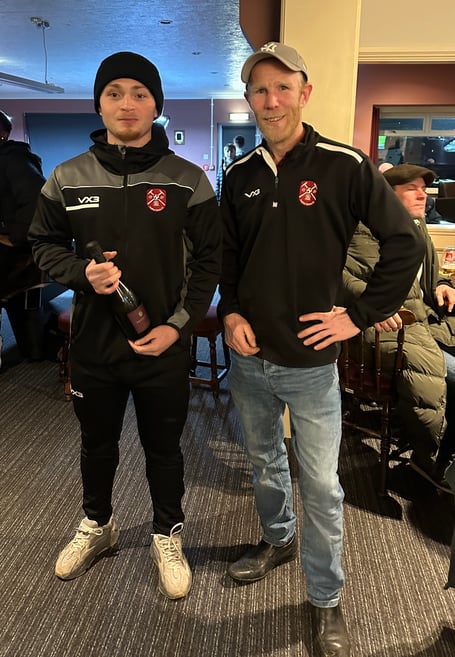 Man of the Match Dan McBeam receives his award from sponsor Jon Filer of JMF Plastering