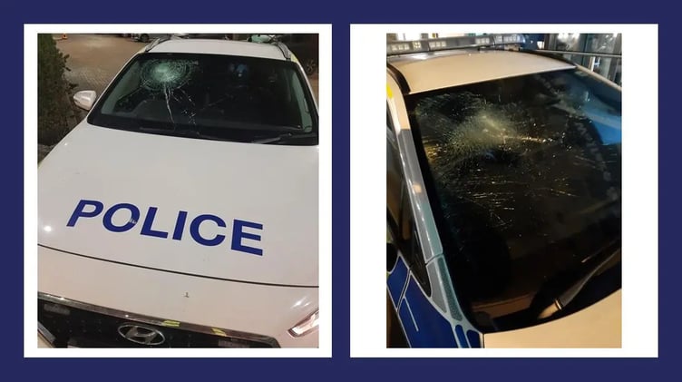 Damaged police cars