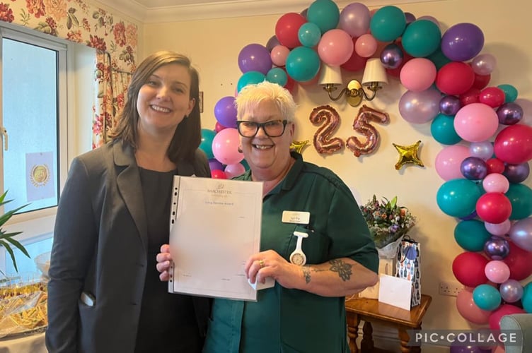 Senior care assistant Lyn Fry receives a 25-year service award at Kingfisher Lodge in Saltford.