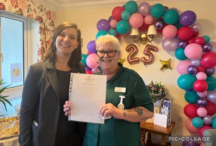 Senior care assistant Lyn Fry receives a 25-year service award at Kingfisher Lodge in Saltford.
