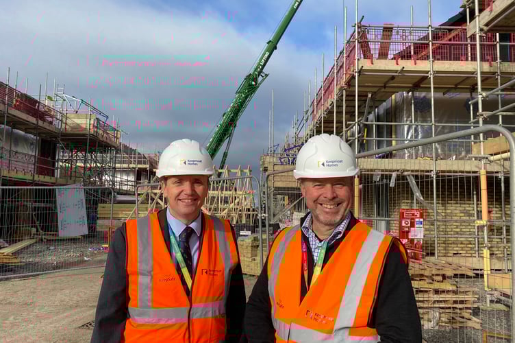 Mark Canniford (right) with North Somerset Council leader Mike Bell (left) at a council-led 425 home development at Locking Parklands in 2023