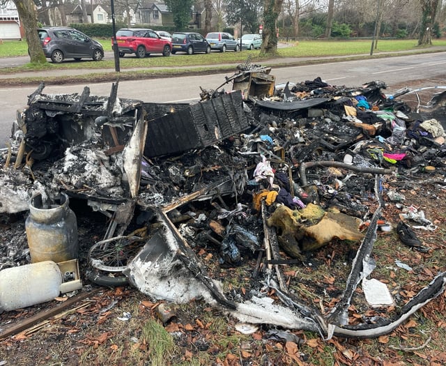 Police probe after caravan torched in 'van dweller' area