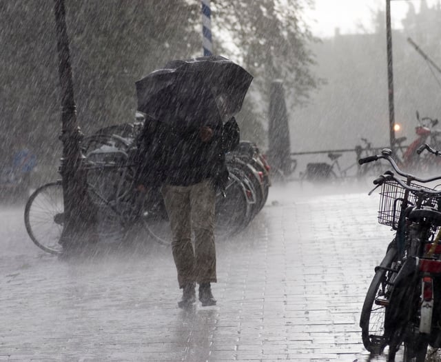Heavy rain spreads across the day with patchy showers tomorrow