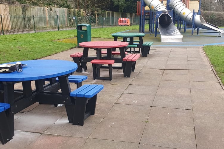 THe newly installed picnic tables and benches prior to the arson.
