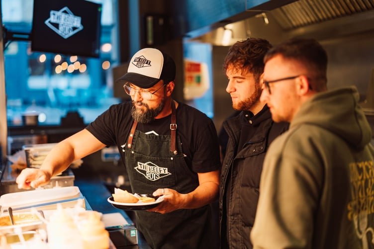 The Beefy Boys have opened a new restaurant on Milsom Street in Bath, transforming a Grade II listed building into a dining venue with an open kitchen, bar, and future outdoor seating.
