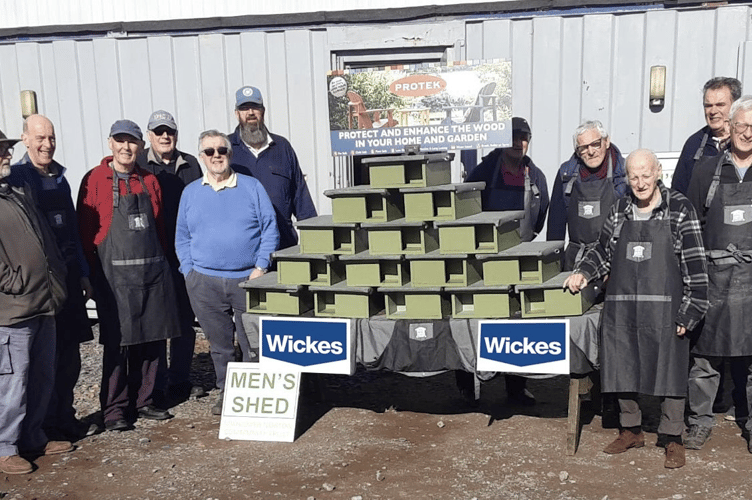 Members of MSN Men’s Shed with the finished hedgehog boxes ready for local schools