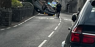 Car flipped onto its roof following crash