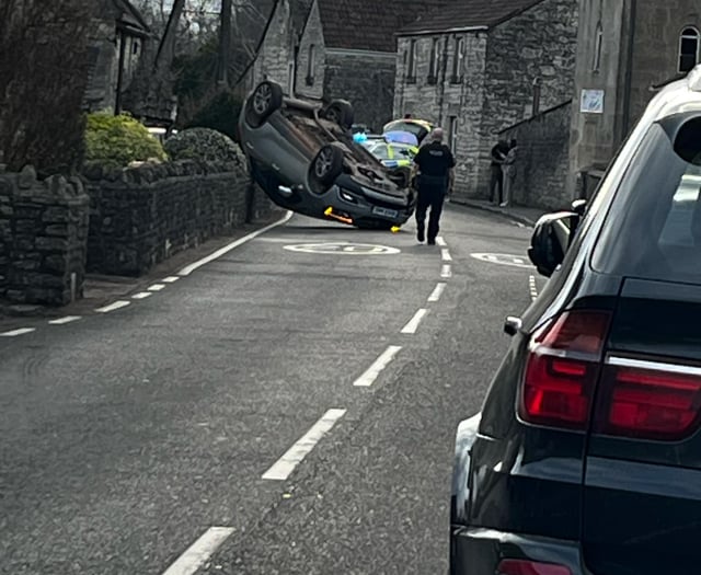 Car flipped onto its roof following crash